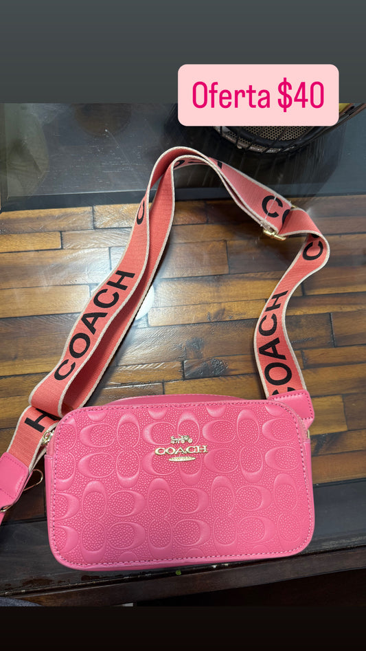 Cartera Coach de lado